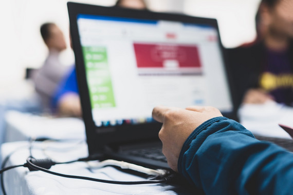 businessman using apps or study online watching webinar on compu